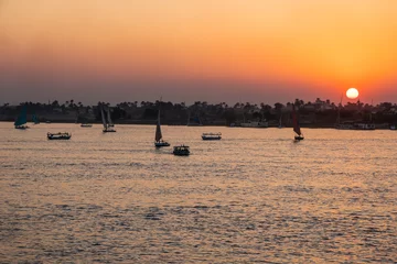 Foto op Plexiglas Felucca on the Nile, Beautiful Sunset on the Nile, Luxor, Egypt © Leo Viktorov