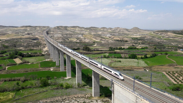 High speed train crossing a viaduct in the Zaragoza province in Spain