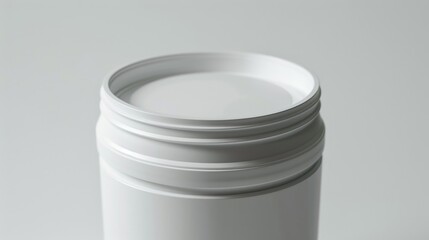 A close up of a white container on a table. Suitable for kitchen or home organization concepts