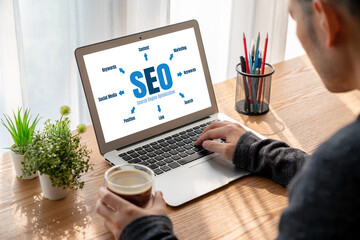 SEO search engine optimization for modish e-commerce and online retail business showing on computer...