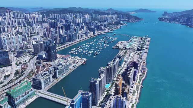 Kai Tak Construction Residential high-rise housing project along the seaside promenade near Victoria Harbour Hong Kong