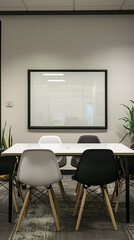 A modern and professional meeting space with clean lines and a neutral color palette, showcasing a blank white frame on the wall for versatile customization or motivational phrases.