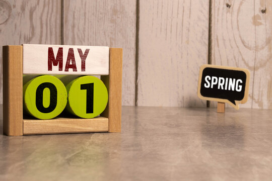 May 1st. Image of may 1 wooden color calendar on white background.