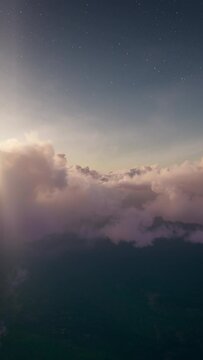 An endless flight through the clouds at sunset. Realistic 3d animation. Loop. Vertical.
