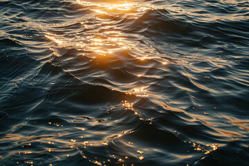 Beautiful lines across ocean surface in golden light.