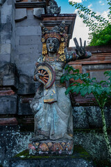 Statue of a hindu god at a temple. Ubud, Bali, Indonesia.