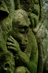 Fototapeta na wymiar Stone sculpture in the Monkey Forest, Ubud, Bali, Indonesia.