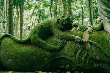 Monkey statue in Monkey Forest, Ubud, Bali, Indonesia.