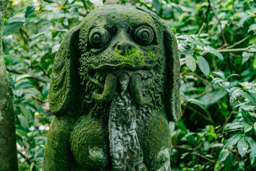 Statue in the Monkey Forest, Ubud, Bali, Indonesia.