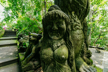 Statue in the Monkey Forest, Ubud, Bali, Indonesia.
