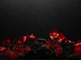 black stone and red plants for product presentation podium - 773573763