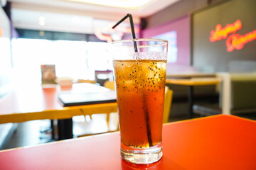 Fresh iced tea with extra basil seeds, Summer drinks concept.