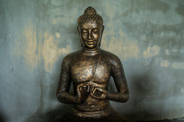 Bronze buddha statue.Ubud, Bali, Indonesia.