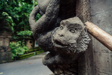 Fototapeta na wymiar Moneky face statue at Monkey Forest Ubud, Bali, Indonesia.