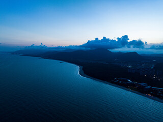 Aerial photography of Jiajing Island, Shimei Bay, Wanning, Hainan, China, in summer evening