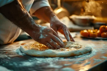 Foto auf Acrylglas The hands of a skilled chef as they expertly prepare a fresh pizza dough. Flour dusts the surface and the chef’s arms, conveying the authenticity of the traditional pizza-making process. © Peeradontax