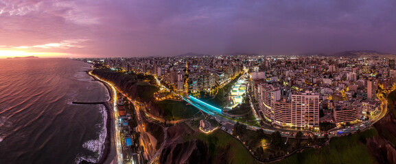Peru's capital Lima and its famous iconic coast line by night panorama