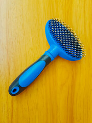 Brush or comb for pet. Brush for cat, kitten, dog, puppy hair and skin. Plastic brush with metal...