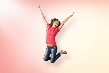 Full body excited woman jump high