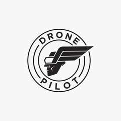 Virtual Reality glasses logo, Drone pilot wing logo icon vector template on white background © DOMHOUZE