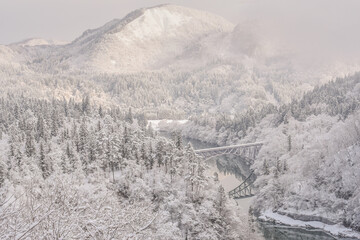 Panoramic Winter View Of Tadami Railway Line Train And Bridge Reflection In The Beautiful Valley Of Tadami River, Mishima Machi, Aizu Kawaguchi, Fukushima, Japan