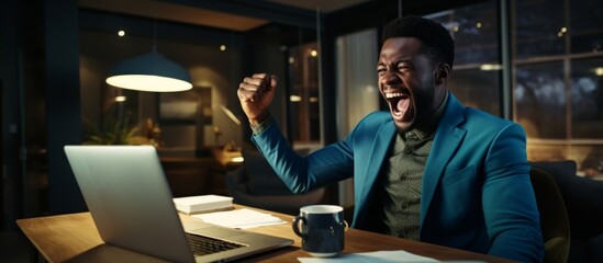 A frustrated man wearing a blue suit is yelling angrily at a laptop screen in a heated moment of distress