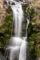 Fototapeta na wymiar waterfall in cordoba argentina called los hornillos tourism trekking and vacations