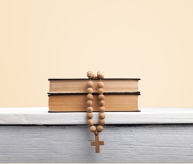 Religion wooden cross and bible book