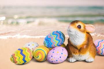 Cute rabbit bunny toy and colorful easter eggs