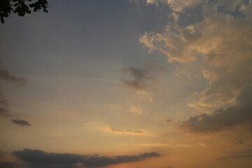 Colorful cloudy sky at sunset. golden color. Sky texture, abstract nature background