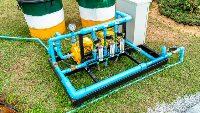 Fertilizer irrigation system with water pipe and gauge machine.