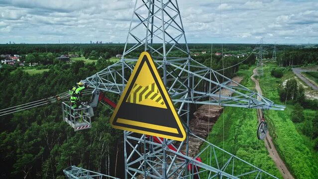 Electric pylon installation site with a added 3D construction sign - Aerial view
