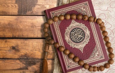 Ramadan Islamic concept holy book on desk - 773650749