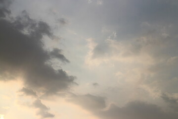 Beautiful colorful dramatic sky with clouds at sunset or sunrise.