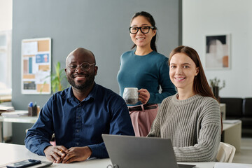 Group Of Diverse Young Managers At Work Portrait - 773669123
