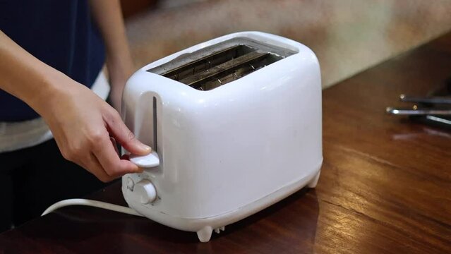 Making Toast in a Kitchen Setting