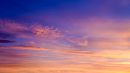 Beautiful multicolored clouds in the sky. Panoramic view of the sky. Bright colors of clouds in the...