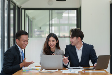 Asian Business people meeting time working with new startup project. Idea presentation, analyze plans. Business Discussing some business ideas. Teamwork concept.