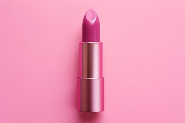 pink lipstick in pink background. Top view flat lay. 