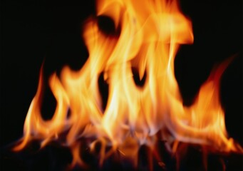 A fire is burning in the background of a black and white photo