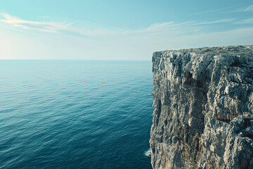Fototapeta na wymiar A rocky cliff overlooks the ocean