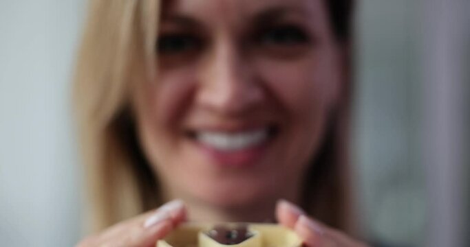 Closeup of a woman smiling with dentures concept