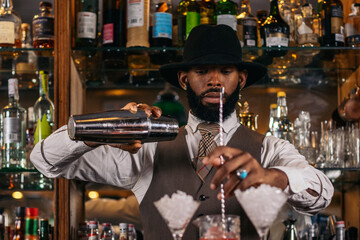 Signature cocktails: a creative bartender at his bar