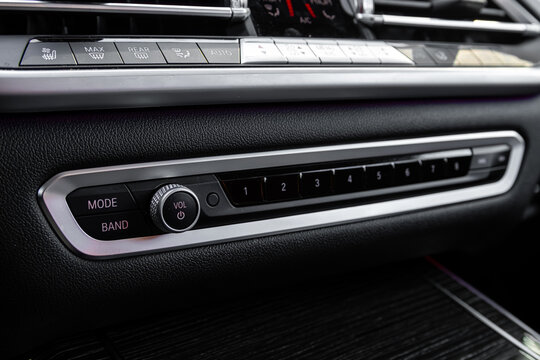 Novosibirsk, Russia - March  23 , 2024:  black  BMW X7 , A close up on a   radio and player.