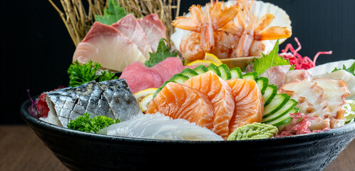 sashimi mixed fresh set japanese food variation in dish. Sashimi Japanese food, Sashimi set with wasabi, fish, shrimp in plate of Assorted. fresh slide mix fish set on ice menu in restaurant