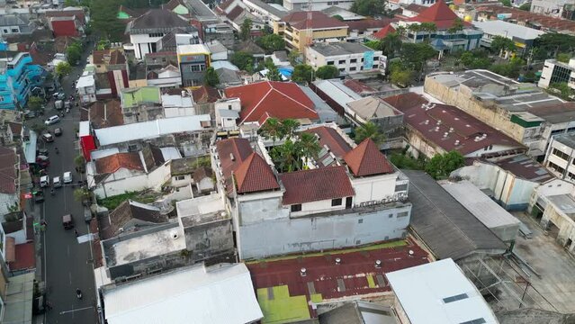 Palm Trees Growing From Within A Hotel In Downtown Malang Rooftop Drone