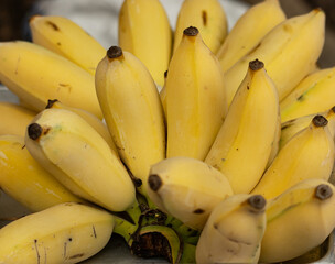 ripe yellow bananas as background.