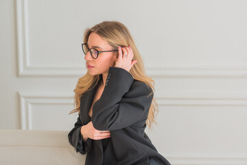 Business woman in black oversize jacket, fashionable outfit for work. Concept of modern lady lifestyle