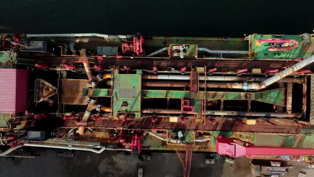Suction-Dredger Vessel On Fraser River In British Columbia. Canada. aerial topdown shot
