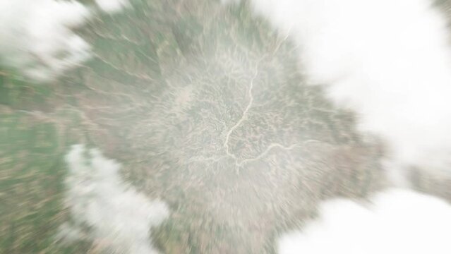 Earth zoom in from space to Aileu, Timor-Leste. Followed by zoom out through clouds and atmosphere into space. Satellite view. Travel intro. Images from NASA